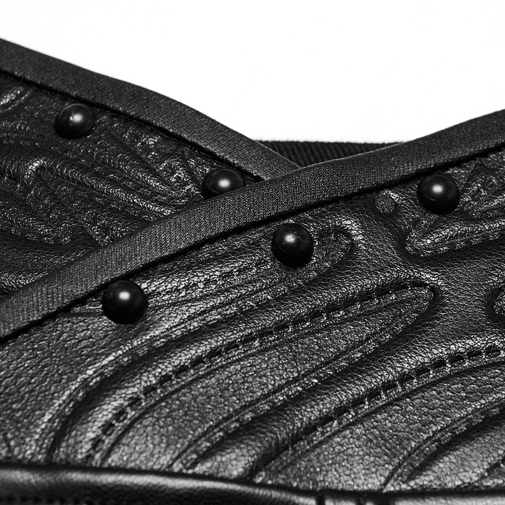 Waistband embossed leather texture close-up, black round stud decorations with stitched decorative lines, gothic-inspired design