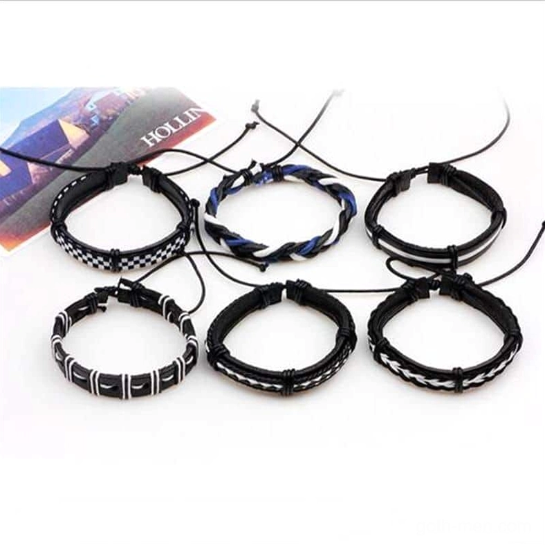 Six-piece adjustable gothic bracelet set with adjustment cords top-down view