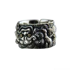 Foo dog mythical beast oxidized dark silver ring with detailed embossed carving close-up detail shot