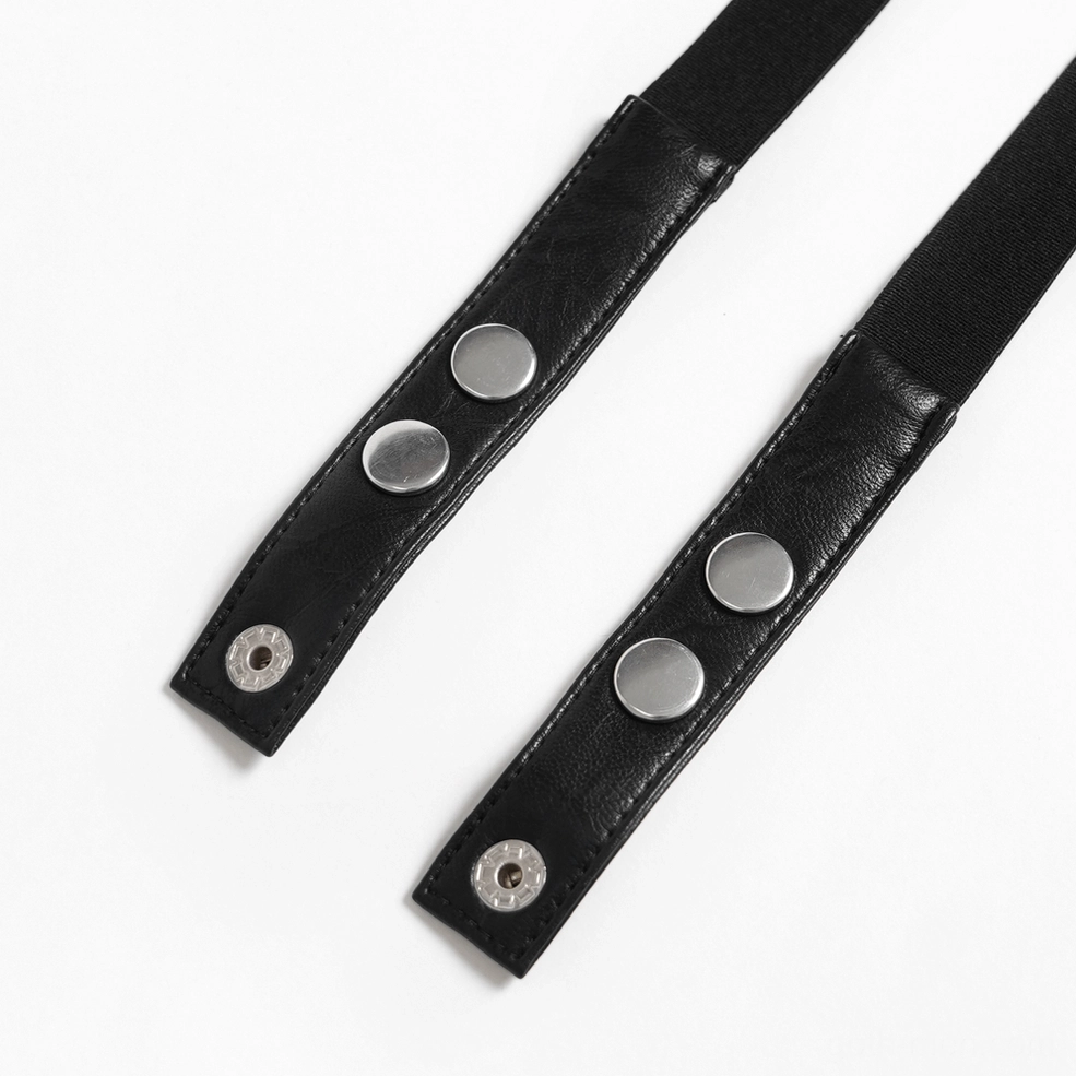 Alternative fashion spike leather choker with chain and ring details, mannequin display