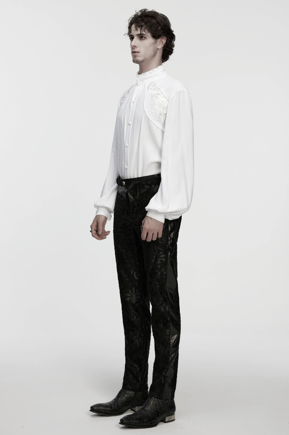 Alternative goth white embroidered shirt three-quarter view highlighting sleeve details and ruffled neckline