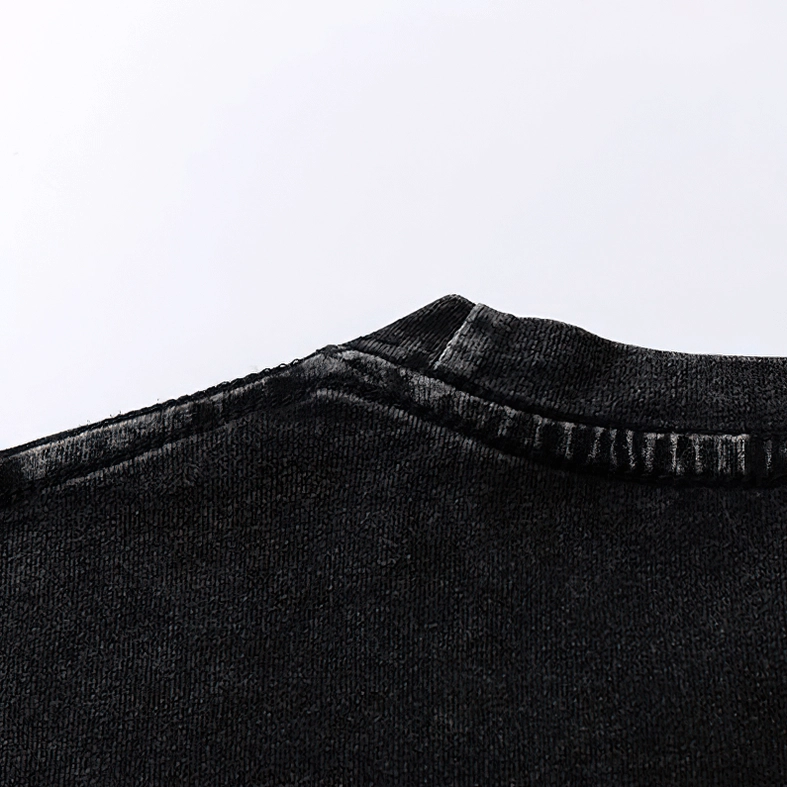 Shoulder and dropped seam detail of black washed cotton anxiety print gothic t-shirt