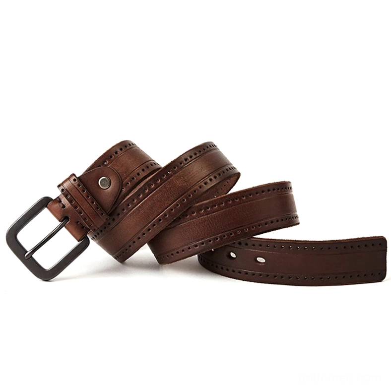 Assorted vintage genuine leather gothic belts, flat lay studio perspective showing multiple brown strap designs and metal buckle variations