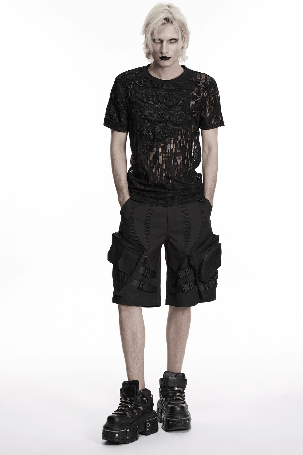 Black mesh lace-up gothic T-shirt styled flat lay display highlighting asymmetric design and alternative fashion aesthetic