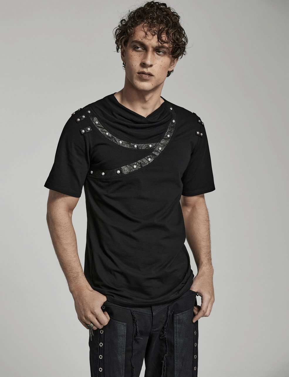 Asymmetric gothic punk t-shirt styled flat lay full garment display with rivet accents