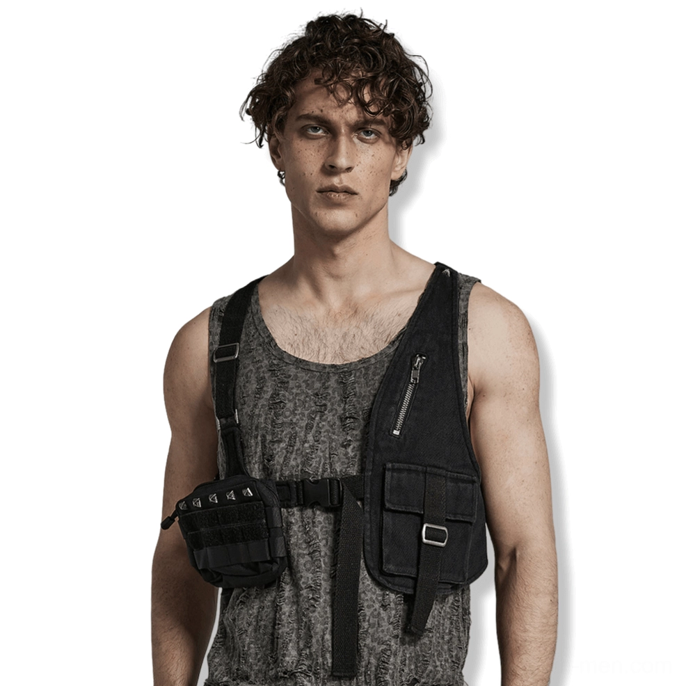 Asymmetric tactical harness crossbody bag front view on male model, black canvas with detachable pouch and metal hardware