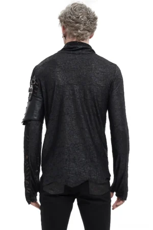 Rear view of asymmetrical gothic mesh top showing leather arm strap, irregular hemline, and crinkled knit fabric texture