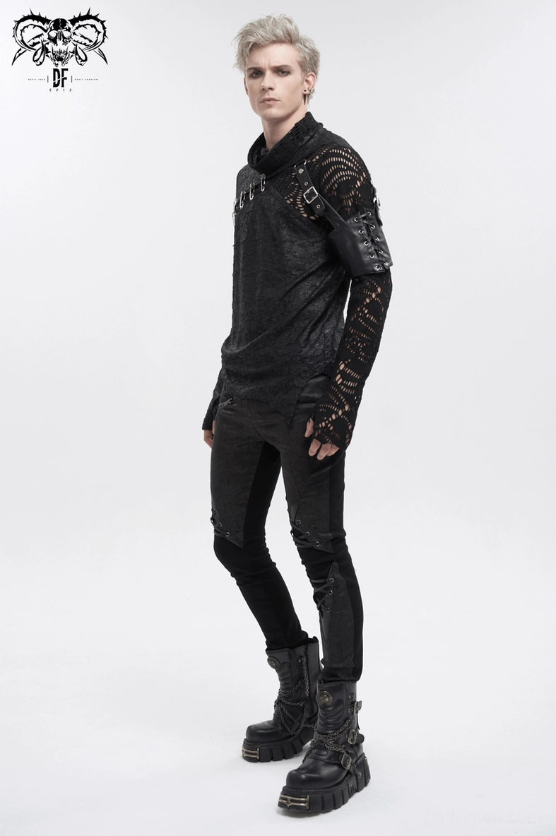 Detailed styling shot of asymmetrical mesh gothic top with removable garters and safety pin embellishments