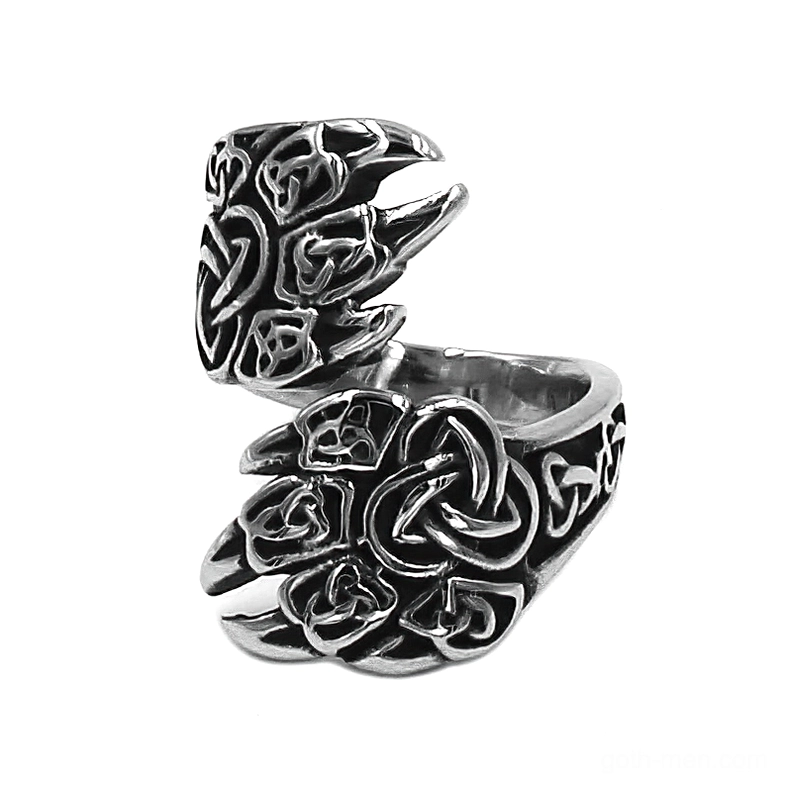 Dark vintage silver bear claw ring side oblique view highlighting the open wrap design with detailed Celtic knot carvings and warrior aesthetic