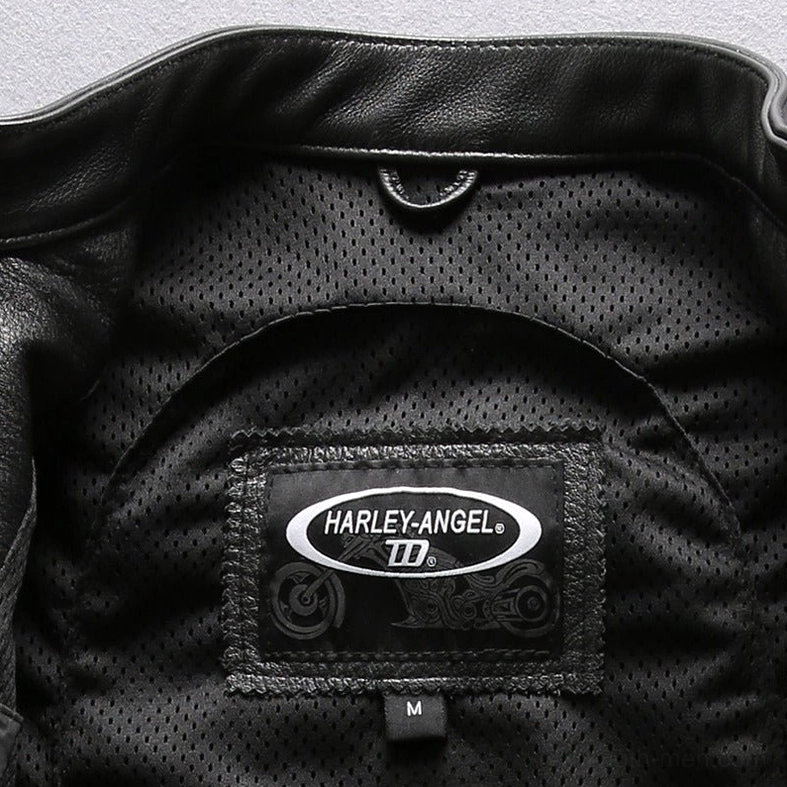 Back view of model wearing black leather motorcycle vest with padded back design