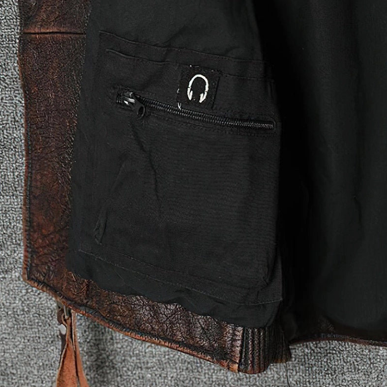 Leather motorcycle vest arm opening and shoulder seam construction vintage brown genuine leather