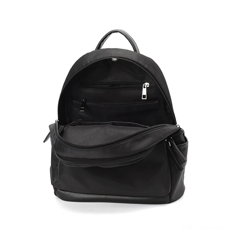 Black gothic backpack opened interior zipper storage compartment inside view