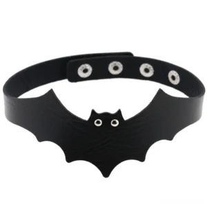 Black bat wing gothic choker with expressive eye details, front flat lay view on white background