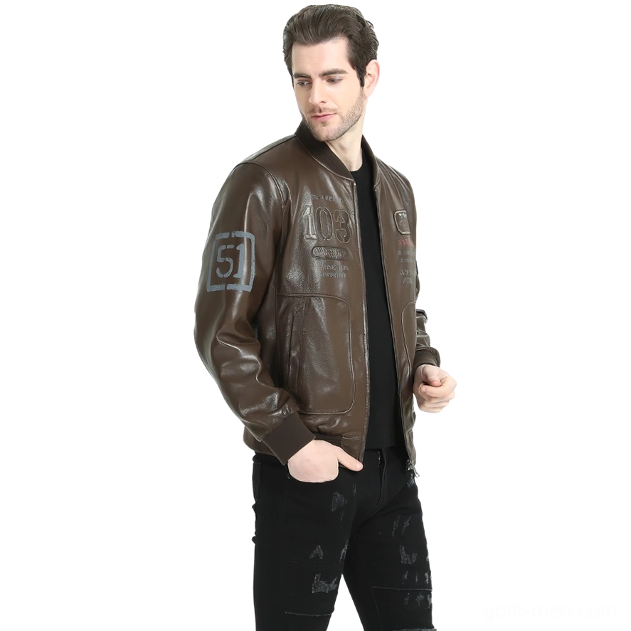 Black genuine leather biker jacket hem and sleeve lining detail close-up