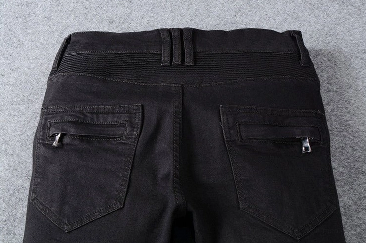 Black biker jeans rear pockets detail - zippered back pockets with belt loops
