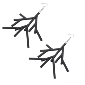 Pair of black branch dangle earrings flat lay top-down view on white background, showcasing matte finish and organic geometric tree branch pattern