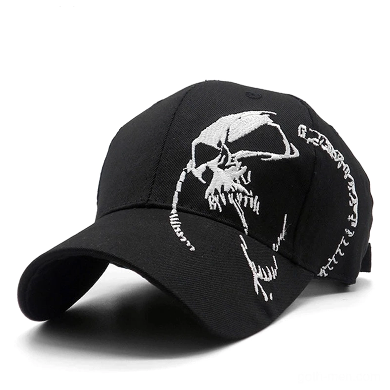 Black gothic cap with side-positioned white skull embroidery, alternative style headwear detail view
