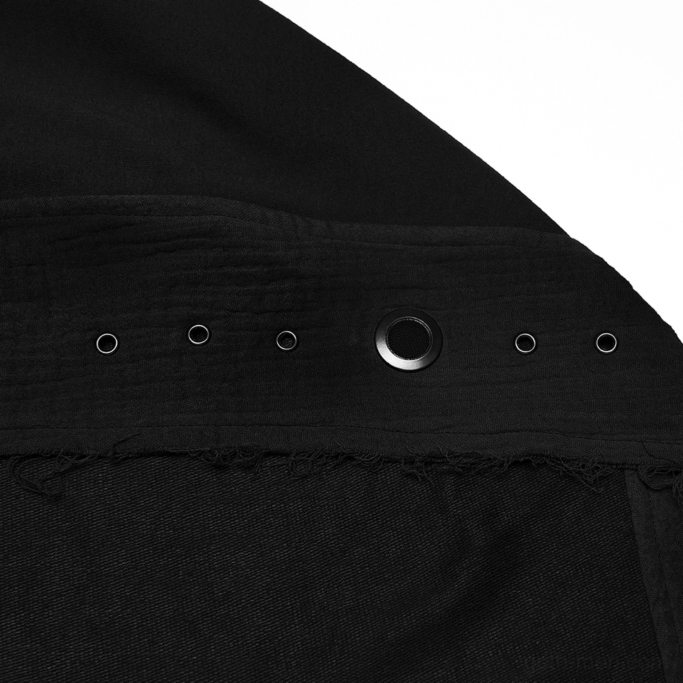 Close-up of matte black woven textile fabric with metal eyelet details