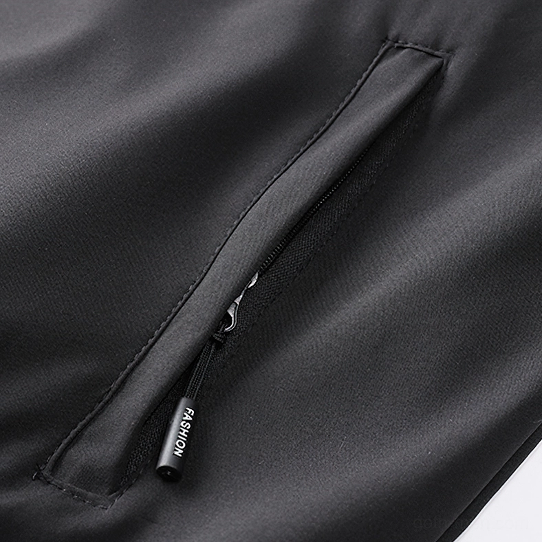 Black cargo bomber jacket side view highlighting multi-pocket design and slim fit silhouette