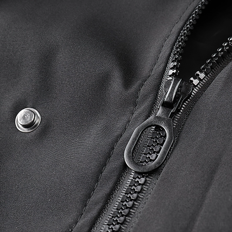 Black cargo bomber jacket metal zipper and snap button detail on nylon fabric
