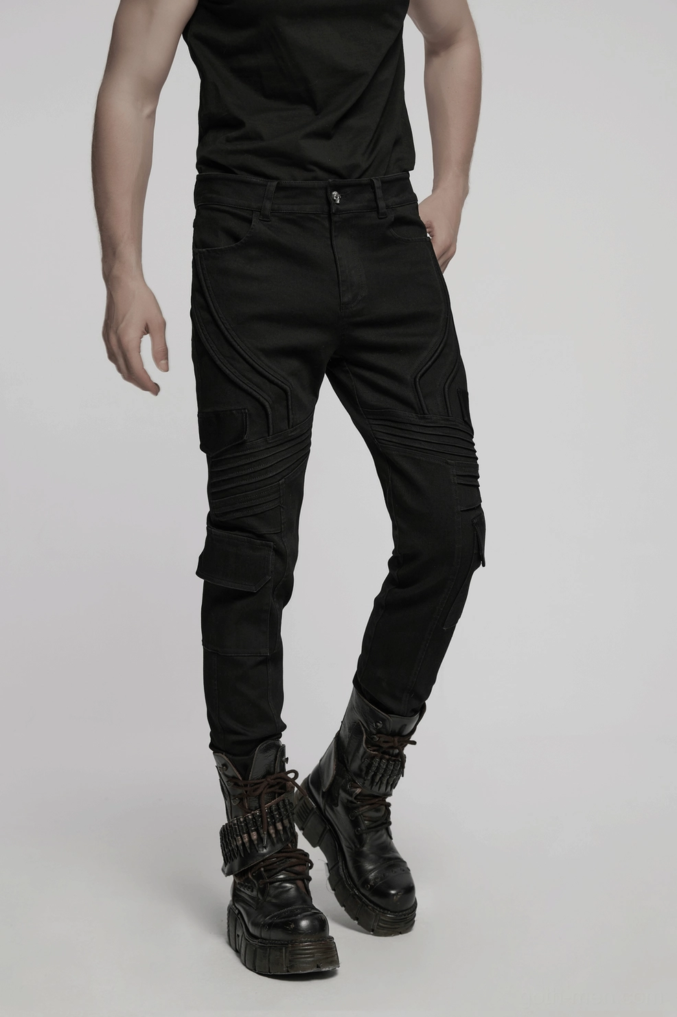 Black punk cargo pants leg detail knee pockets architectural stitching close-up
