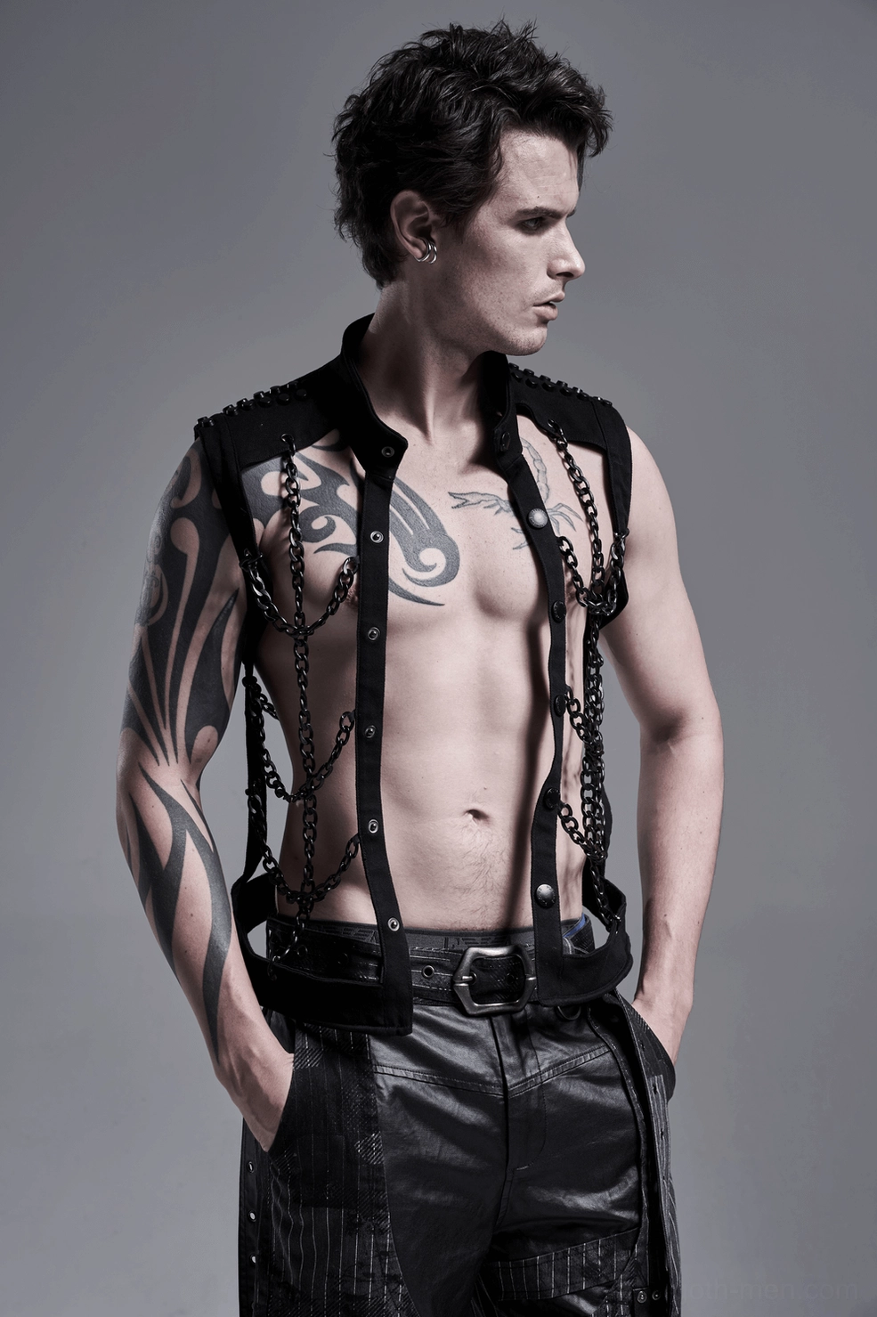 Black chain gothic harness vest alternative fashion styling, industrial aesthetic, festival wear inspiration
