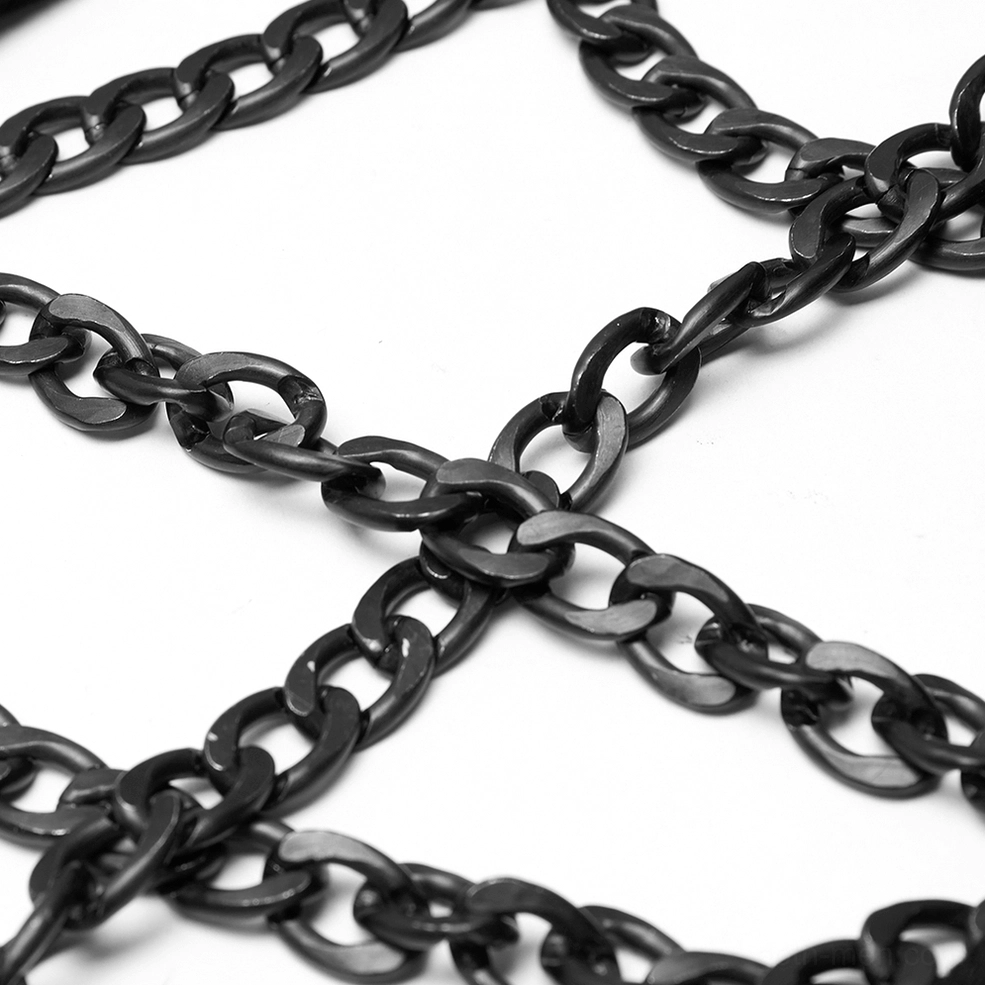 Black chain gothic harness vest aluminum chain closeup, flat chains cross grid pattern, rust-resistant metal construction
