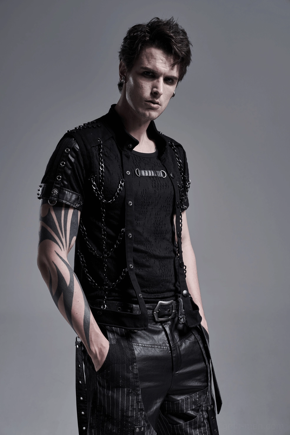 Black chain gothic harness vest fit demonstration, form-fitting silhouette, athletic build showcase