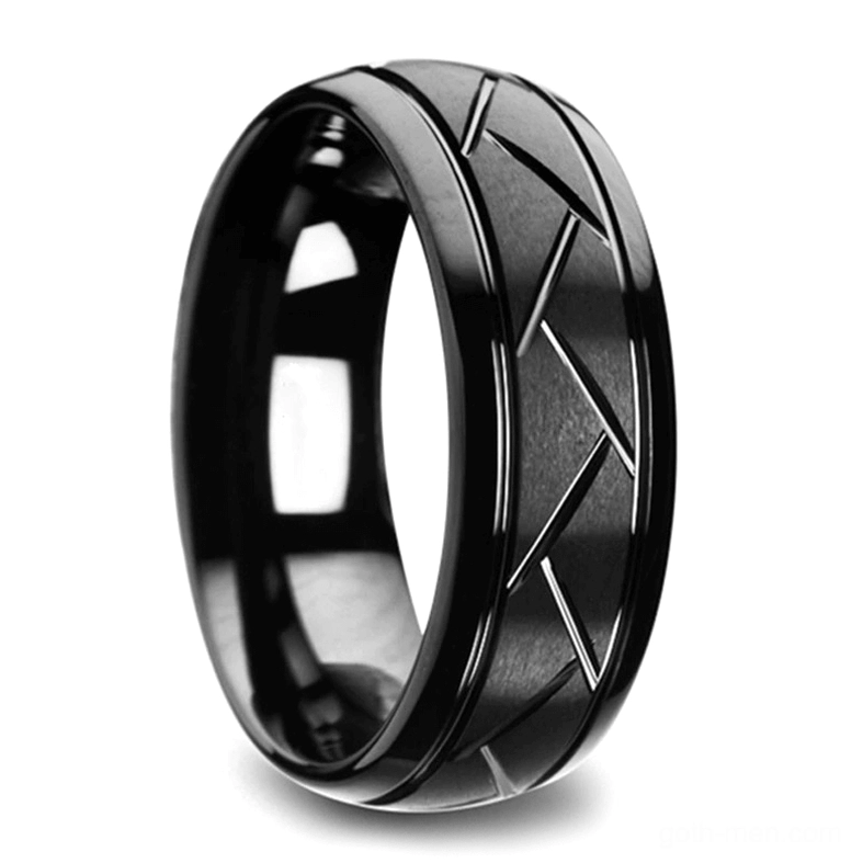 Black metal chevron zigzag gothic ring with polished edges, 3/4 oblique view showing engraved geometric pattern