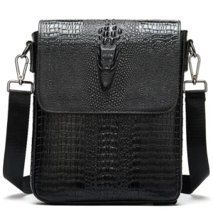 Black crocodile pattern leather gothic messenger bag for men - front view with metal crocodile head emblem and vintage hardware details