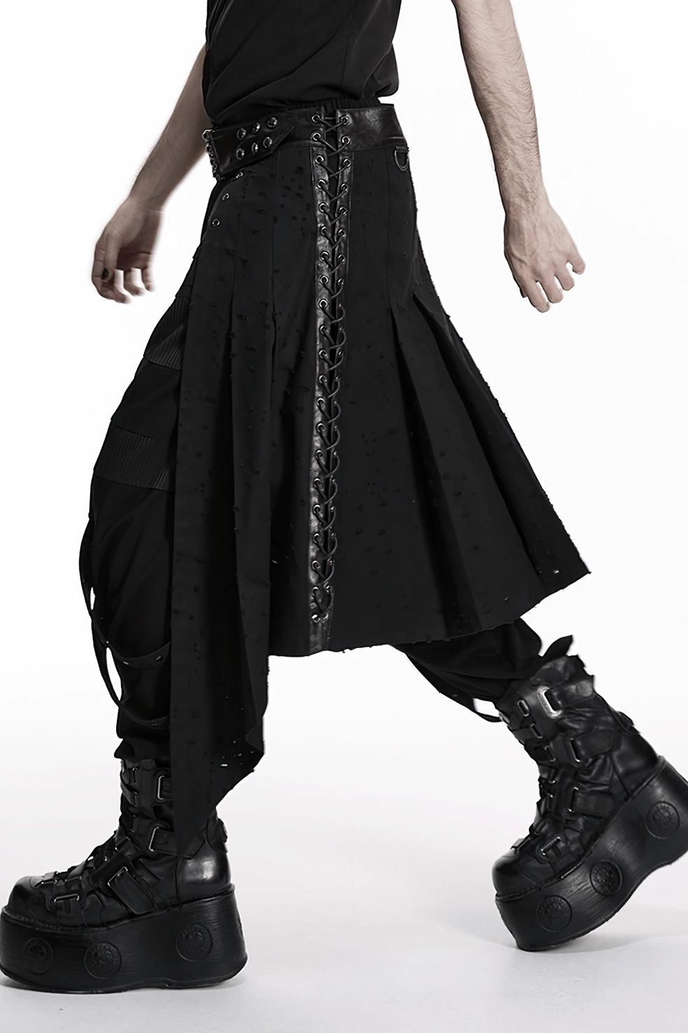 Black denim gothic skirt showing perforated texture and punk aesthetic styling details