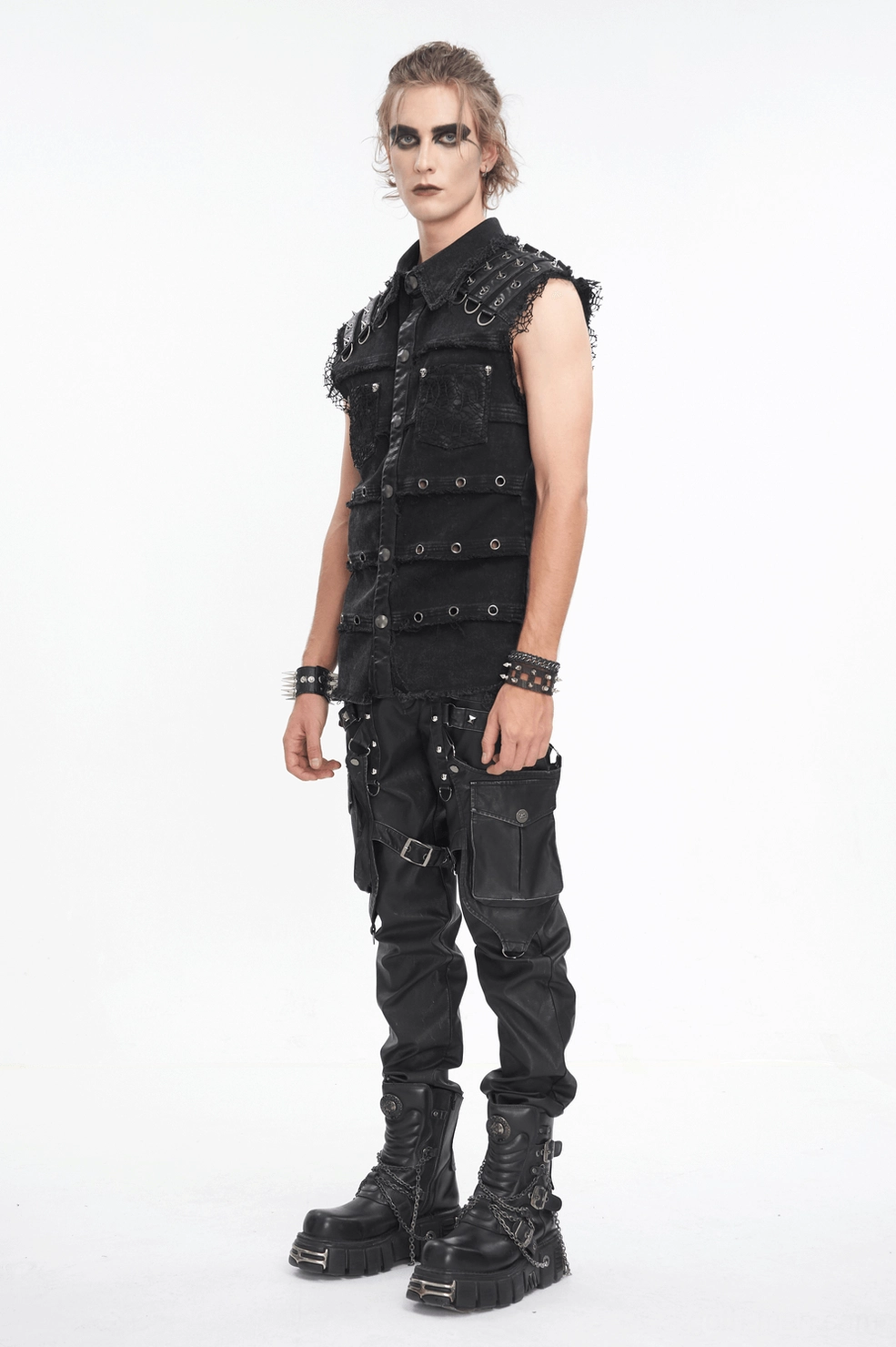 Black denim punk vest with grommets - front quarter view showing stud placement