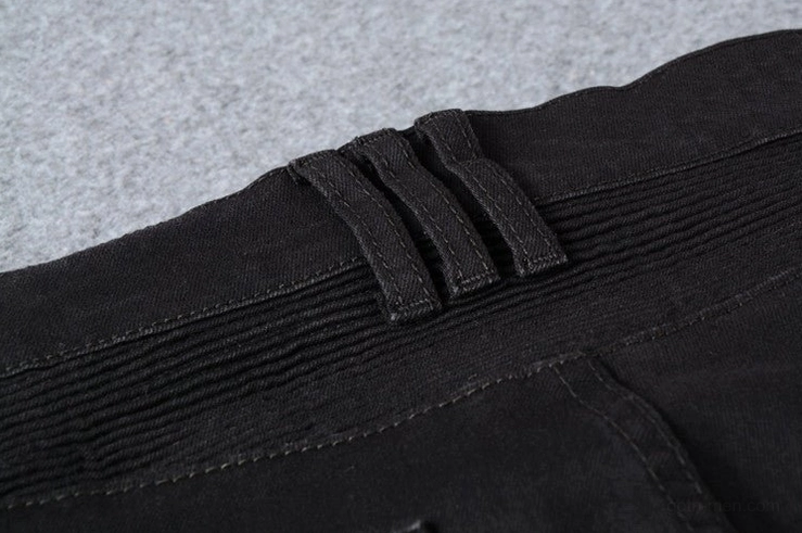 Black denim jeans waistband detail - multi belt loops and ribbed stretch fabric