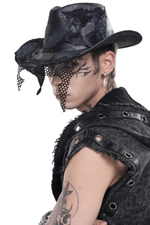 Black distressed gothic cowboy hat with fishnet mesh patches, side profile view on male model with alternative styling