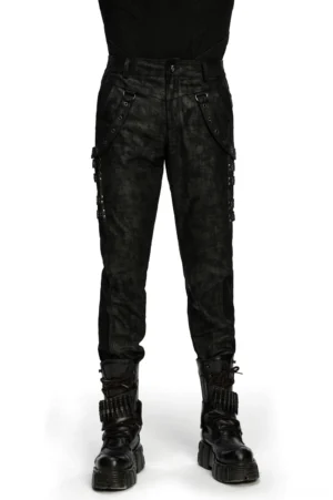 Black distressed gothic slim pants front three-quarter view with metal eyelet side straps on male model