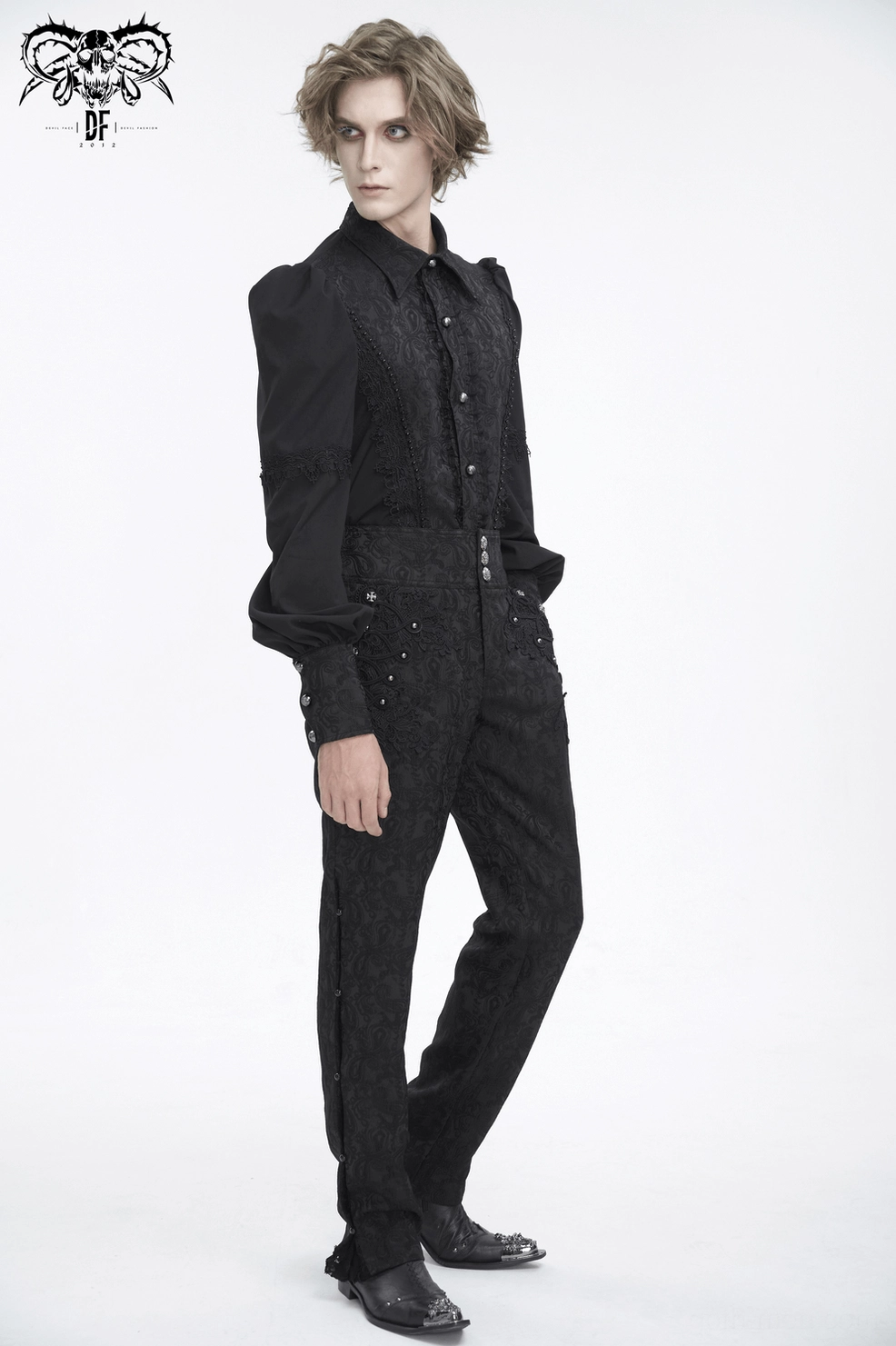 Black embroidered pants detail view of jacquard pattern quality and finish