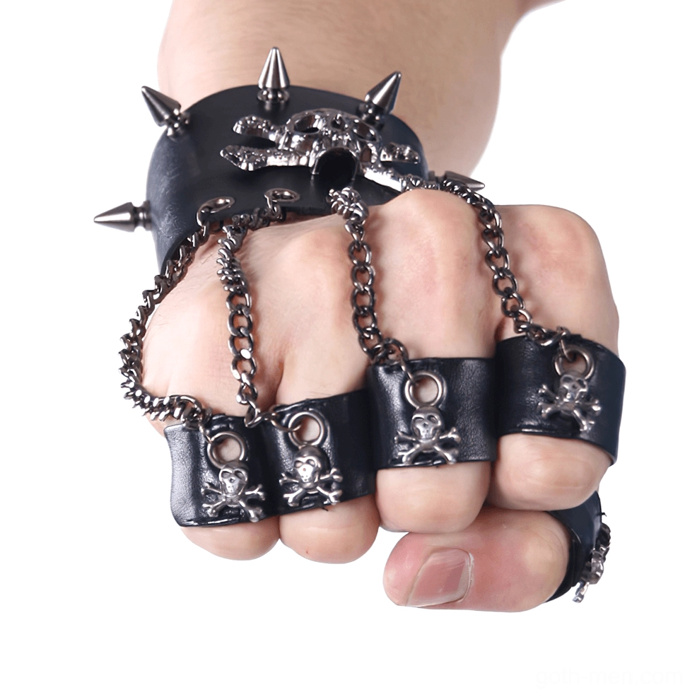 Black skull fingerless leather gloves front fist view with finger cuffs and spike wristband for gothic style