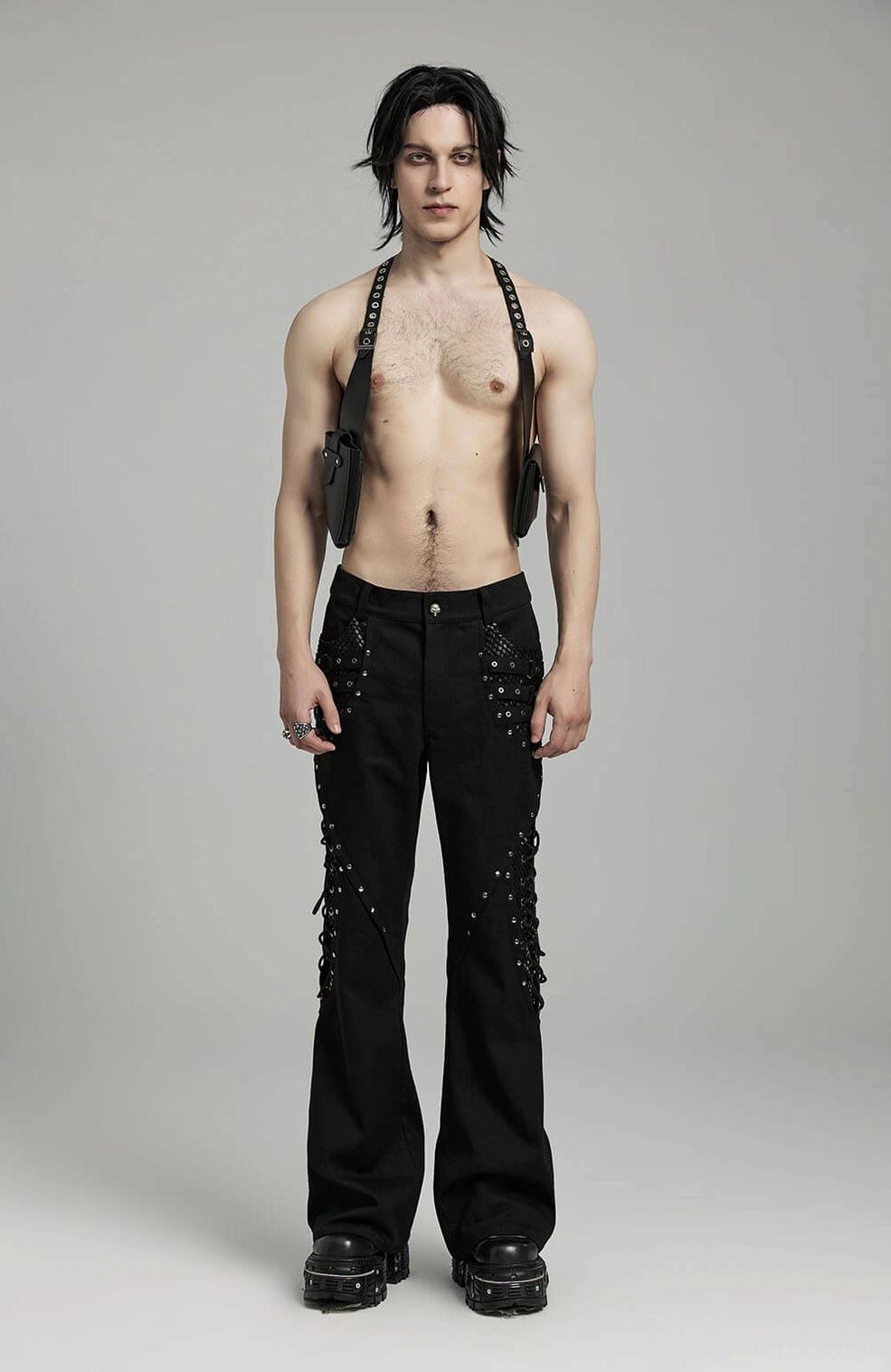 Split side panel and mesh lace-up construction of black gothic flare pants