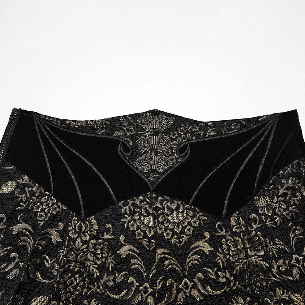 Rear flat lay of black and gold jacquard gothic pants showing solid velvet waistband and complete gold jacquard fabric coverage