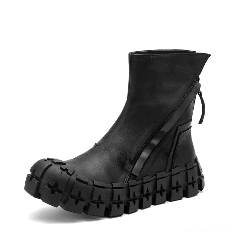Single black goth ankle boot showcasing rear zipper pull tab and chunky industrial tread sole
