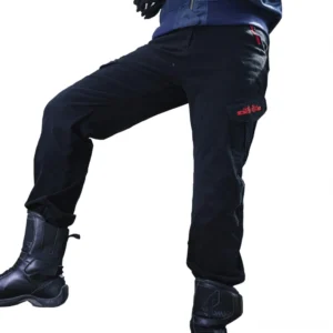 Black tactical cargo pants side angle with combat boots styling, goth motorcycle aesthetic