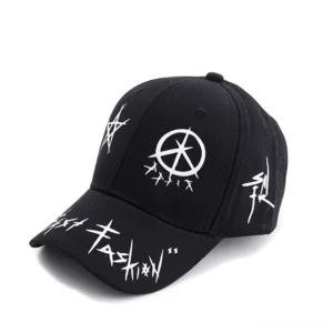 Black gothic graffiti snapback baseball cap with white anarchist symbols and punk letter prints, front three-quarter view