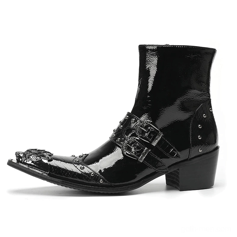 Pair of black patent leather gothic ankle boots with pointed toe and metal hardware detail shot