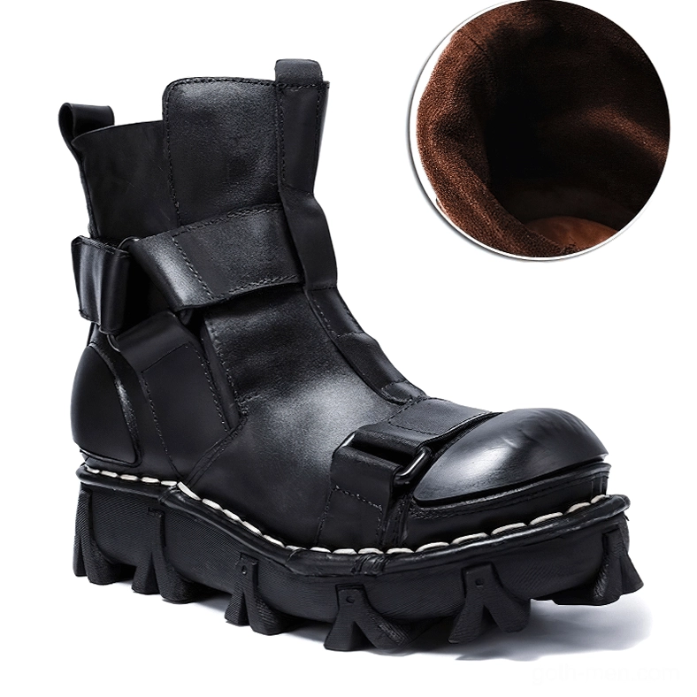 Black leather ankle boots with buckle straps, polished toe cap, and detailed inner lining close-up - gothic punk style side view