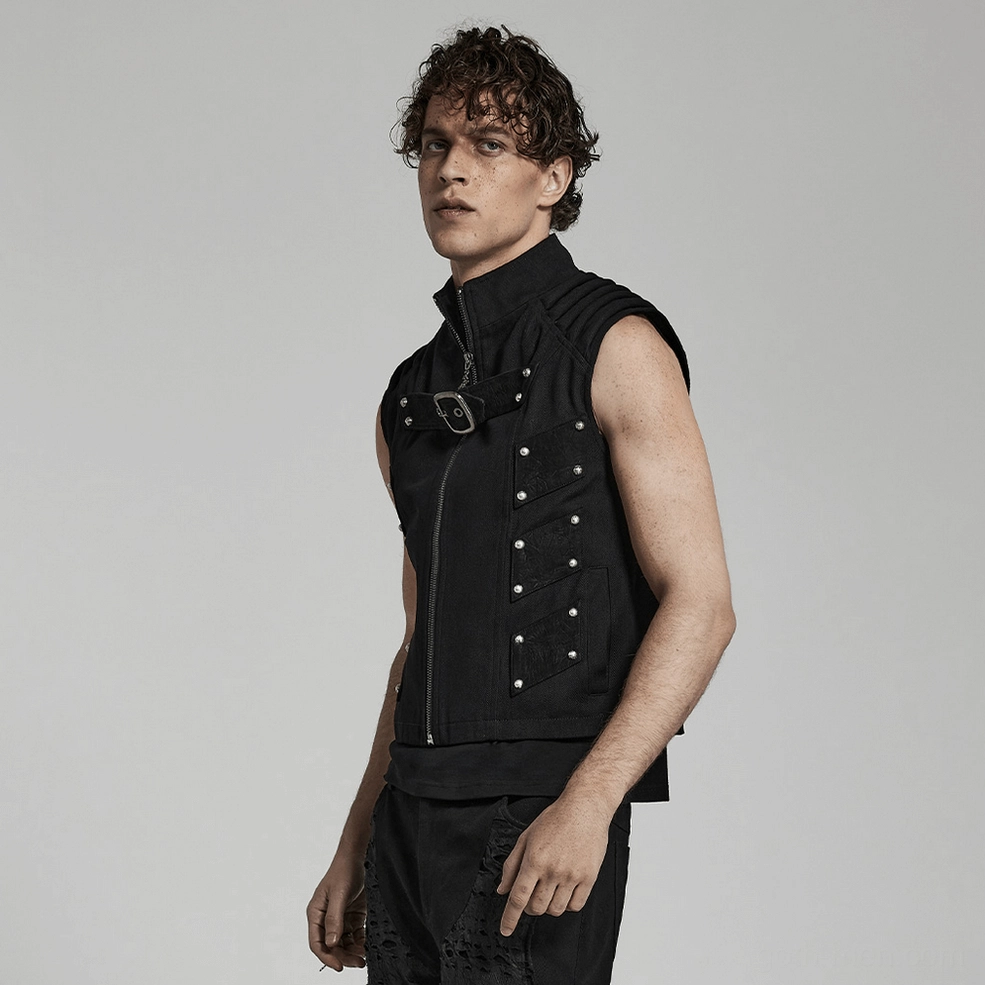 Black gothic studded armored vest close-up on model, showcasing semi-circular rivet pattern and dimensional hardware aesthetic