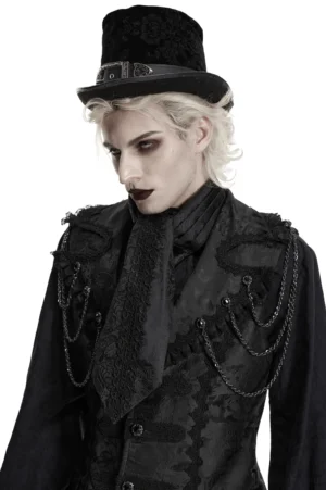 Male model wearing black gothic jacquard ascot tie with waistcoat and top hat, left three-quarter studio view