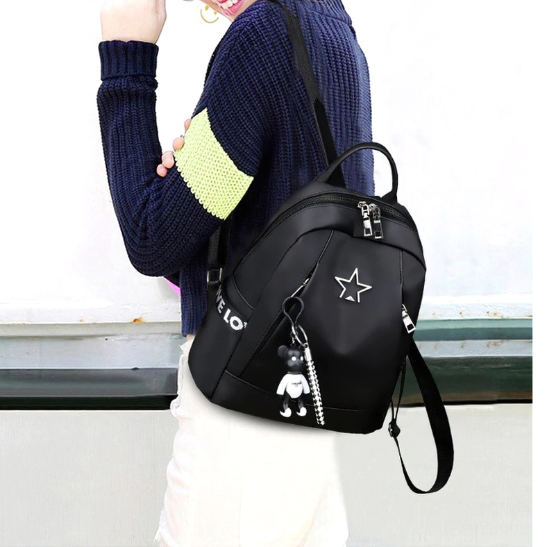 Black gothic leather backpack embossed texture and premium silt finish detail close-up view