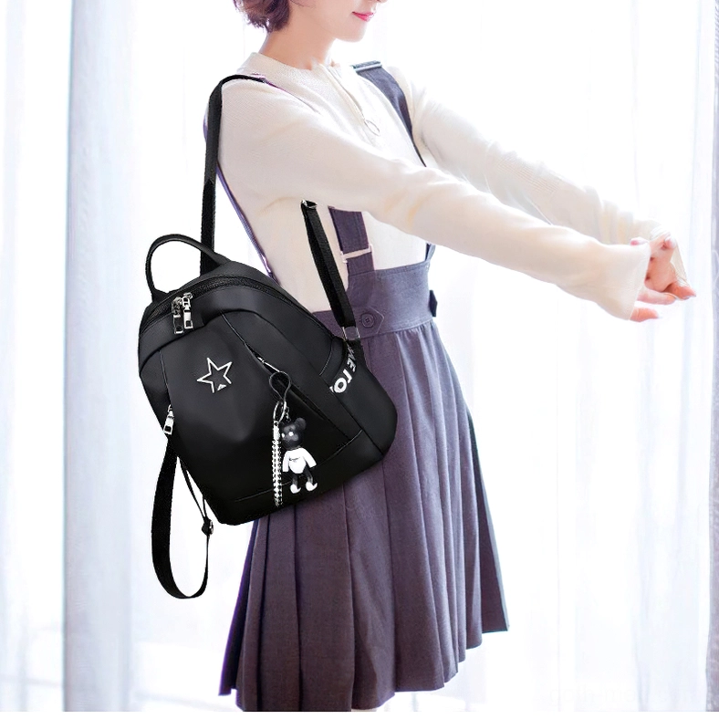 Black gothic PU leather backpack rain cover protection feature practical goth aesthetic design