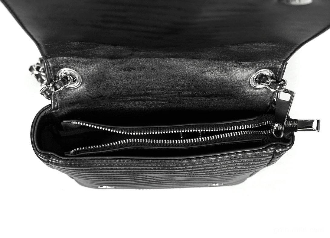 Interior view of black gothic biker bag showing leather lining and built-in zipper pocket