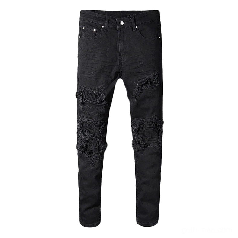 Black distressed gothic biker jeans with patchwork ripping at knees, slim fit pencil silhouette, full length front view on flat lay